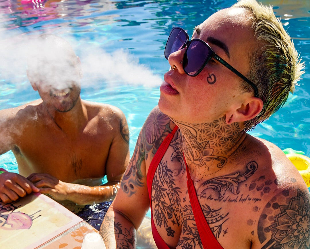 Model in pool with product